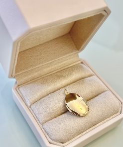 Pingente relicário oval liso