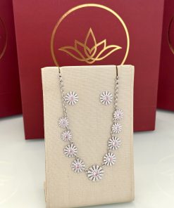 Conjunto florzinhas rosa claro