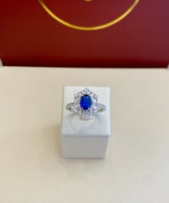 Anel pedra azul/halo floral